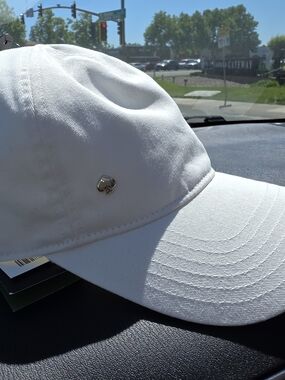 kate spade white baseball cap with gold spade logo